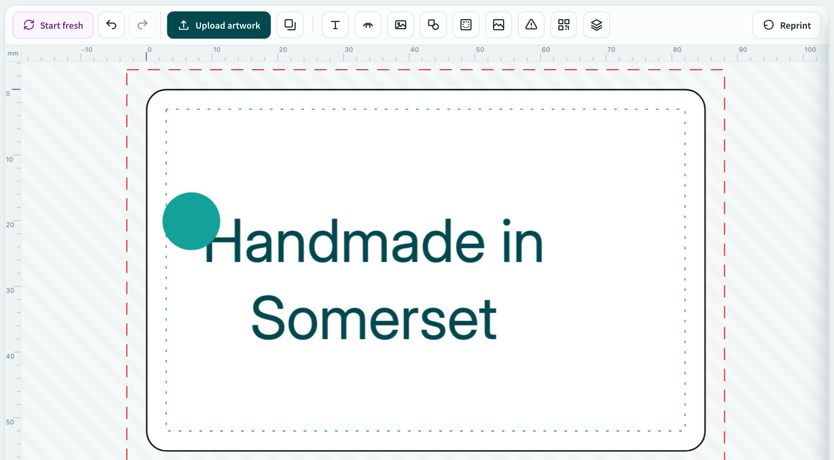 The online label designer showing the toolbar, cut line, bleed and safe area guides