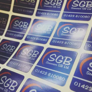 Labels printed on Silver Satin Metallic Vinyl – Permanent