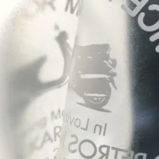 Clear label on a dark surface, kept visible by a white ink underbase